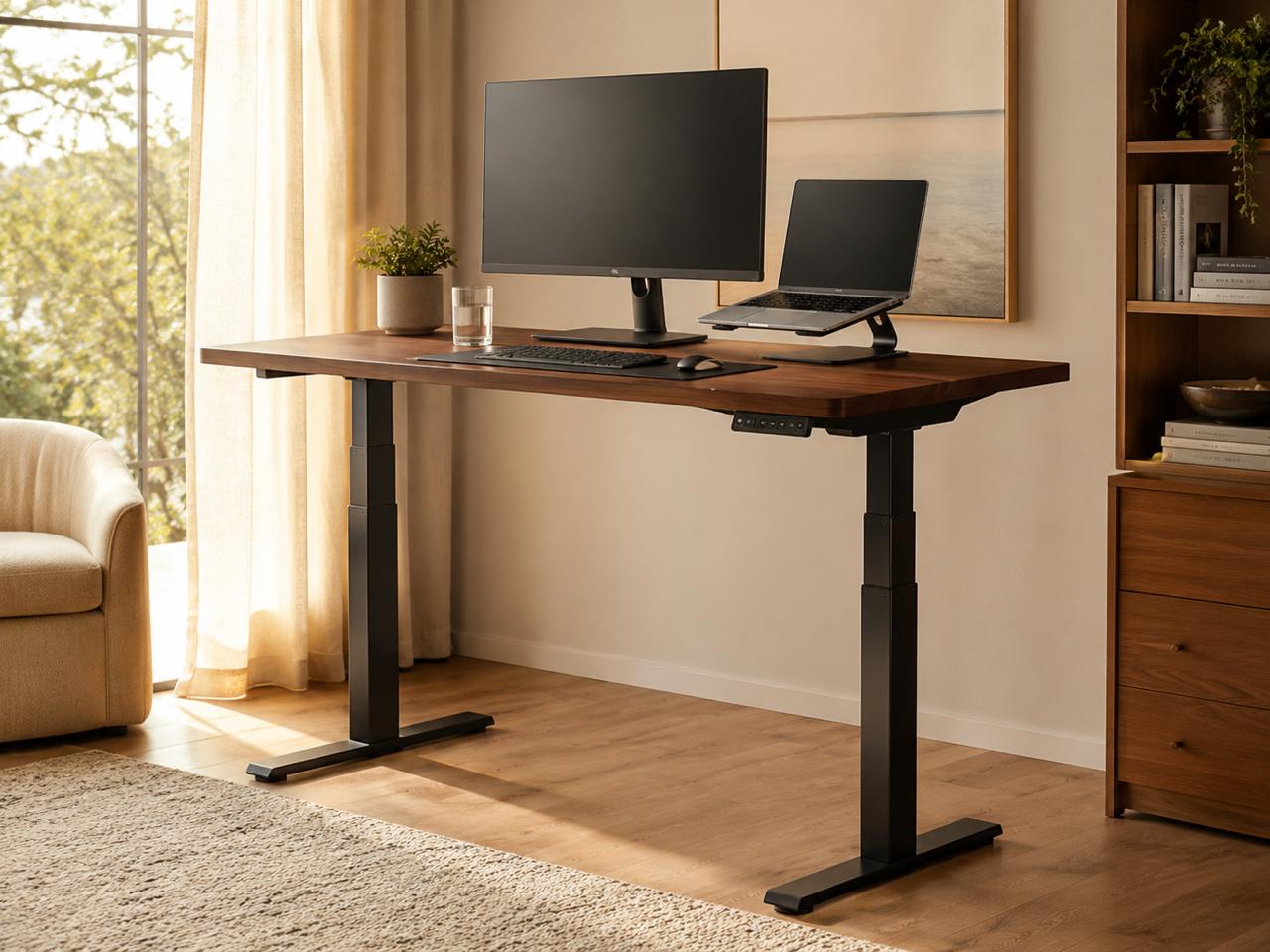 Adjustable standing desk with a wood desktop, monitor, laptop stand, and height controls.
